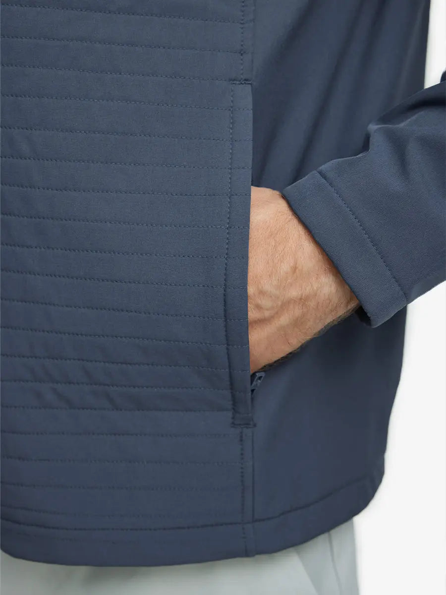 Detail shot of hand in right pocket showing the Misty Blue Jacket’s functional side pocket