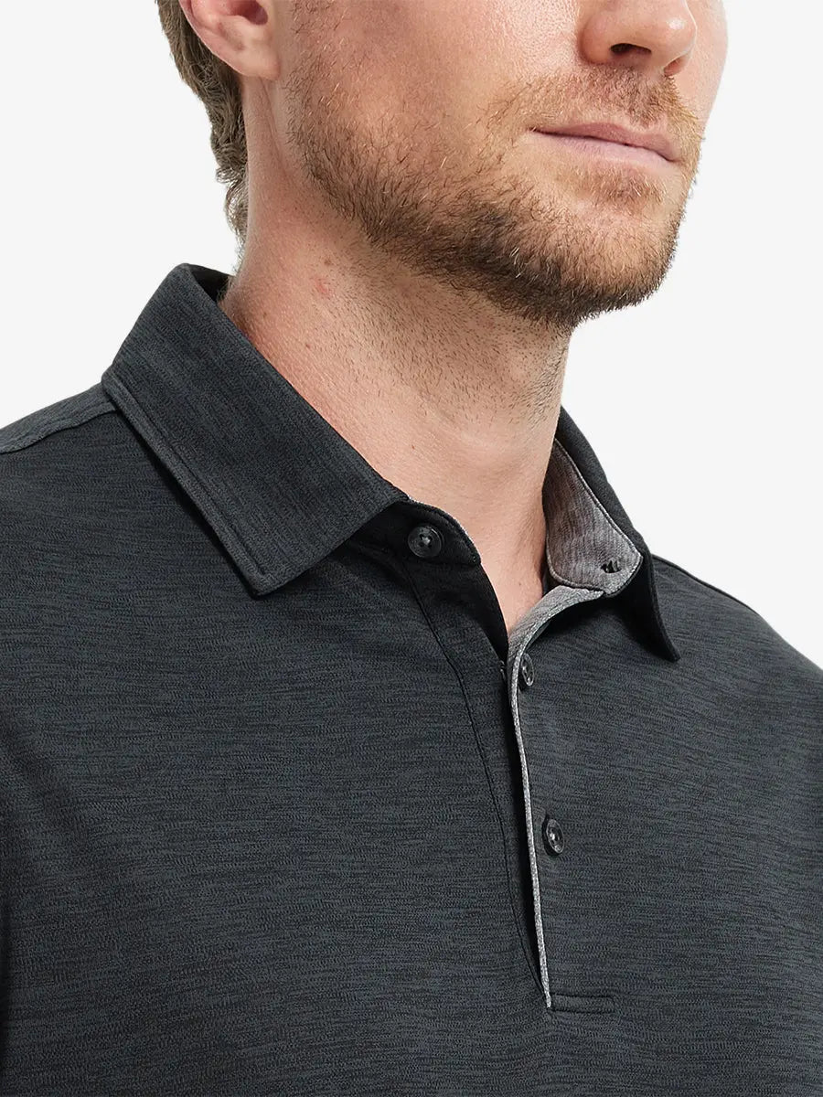 Close-up of Modern Fit Melange Polo front (nose to chest) in BLACK HEATHER, showing subtle melange texture.