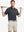 Model in Modern Fit Melange Polo BLACK HEATHER, front half-body holding golf club, highlighting casual style.