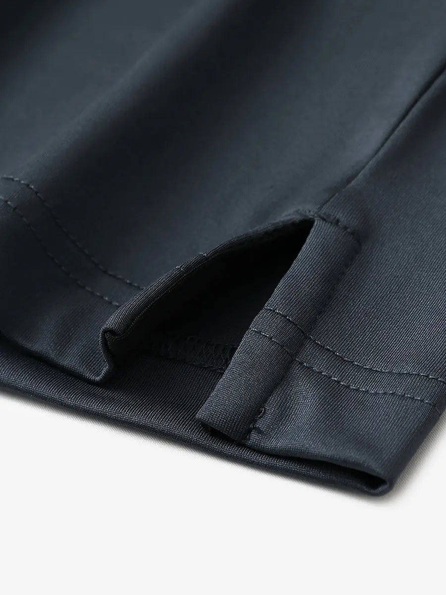 Close-up of hem slit detail in BLACKDARK GREY Premium Performance Polo