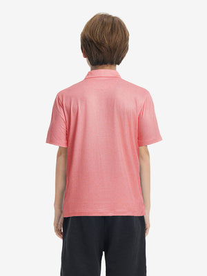 Back half-body view of youth wearing candy pink line performance print boys golf polo, showing rear design