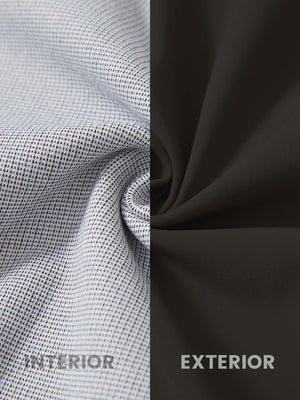 Close-up of fabric on water-resistant heat-tech softshell winter jacket with hood, showing texture in coffee.