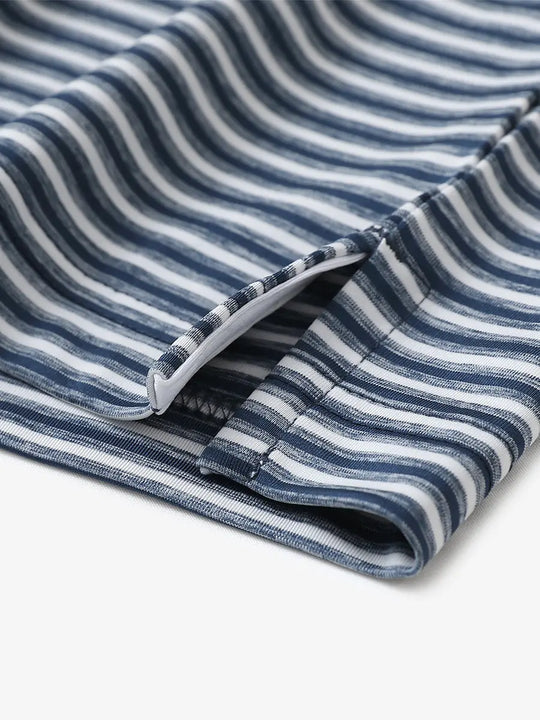 Close-up detail of hem opening on Sport Fit Stripe Polo in Dark Blue Stripe
