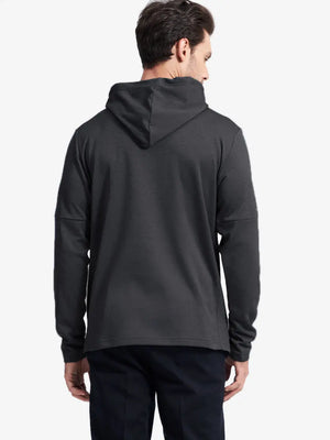 Another front half-body view showing fit of Dark Grey Heather fleece hoodie