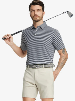 Front half-body shot of model holding golf club, wearing Sport Fit Stripe Polo in Dark Grey Stripe