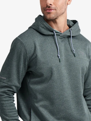 Front view from nose to chest of model wearing Classic Heather Fleece Hoodie in Green Heather