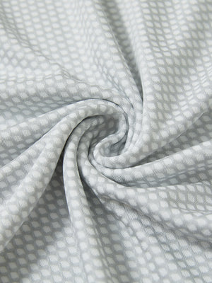 Jacquard quarter zip pullover, close-up fabric detail in light grey showing textured knit pattern and soft feel