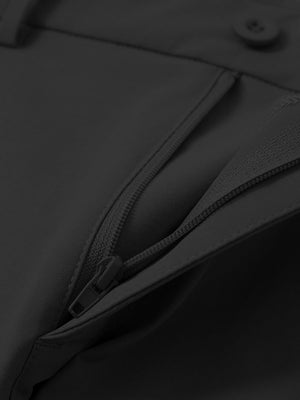Detail view of the zipper on the black youth water resistant cotton blend golf pants, highlighting secure closure