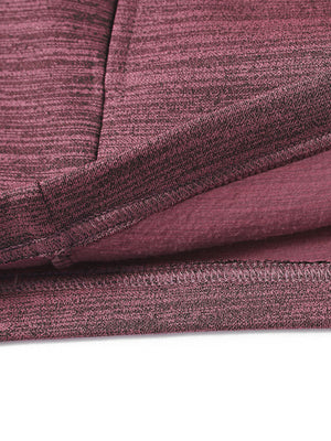 Close-up of the inner hem detail on the red heather Heather Fleece Hoodies Pullover, showcasing the soft interior finish