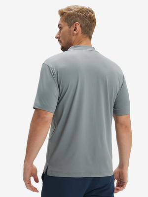 Side-back half-body view of model in grey moisture-wicking short sleeve henley shirt