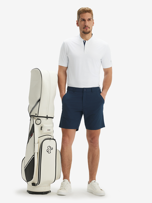 Full-body front view: model in white Henley with golf bag.