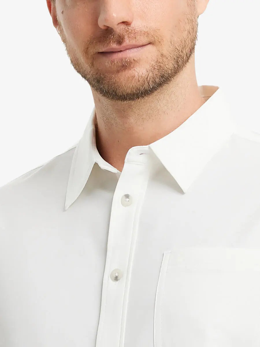 Front view from nose to chest showcasing the crisp BEIGE polo.
