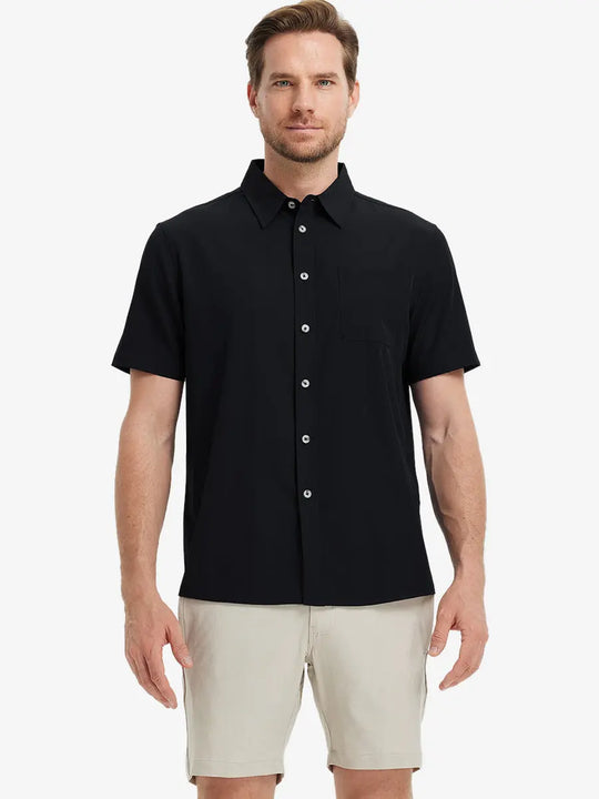 Half-body front view holding a golf club, wearing the BLACK polo on the course.