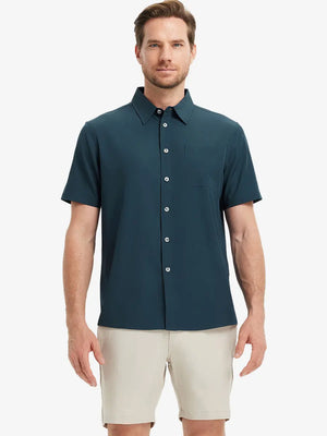 Half-body front view holding a golf club, wearing the BLUE INDIGO polo on the course.