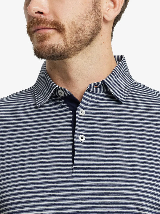 Front close-up shot of model from nose to chest wearing Sport Fit Stripe Polo in Navy Stripe