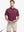 Model in Modern Fit Melange Polo WINE HEATHER, front half-body holding golf club with confident stance.