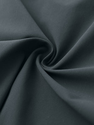 Close-up of quick dry casual shorts with 4 pockets fabric, breathable dark grey texture with smooth finish